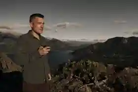 Dan Case overlooking a mountain lake in Patagonia